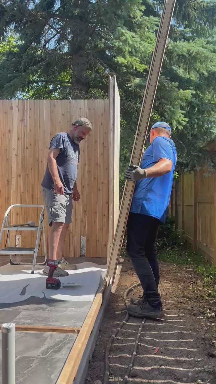 Load video: Each panel is easily fitted onto the double-stack pressure treated floor.  Using only a few screws and secured to the next panel.
